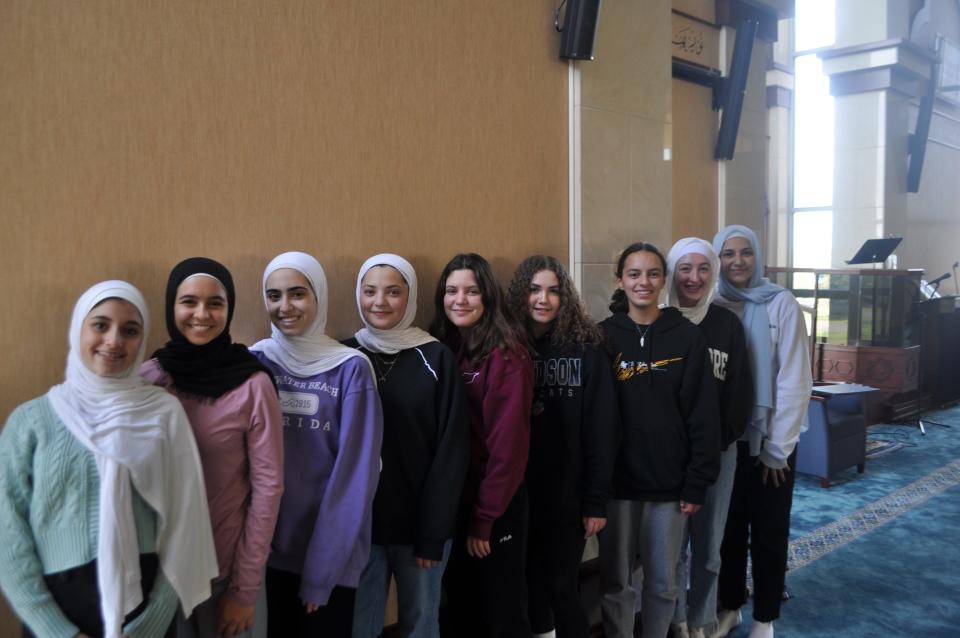 Nine Muslim students who attend the Noor Islamic Cultural Center, 5001 Wilcox Road, in Hilliard started a petition drive to ask Hilliard City Schools to name two Muslim holidays as district holidays. Pictured from the left inside the Noor Islamic Cultural Center are Ranim Farra, a freshman at Worthington-Kilbourne High School; Bushrah Alhyari, a freshman at Dublin Coffman High School; Ayah Azrak, a freshman at Metro Early College; Salma Khawam, a sophomore at Davidson High School; Randa Khawam, a seventh-grade student at Weaver Middle School; Nour Hafez, an eighth-grade student at Hilliard Weaver Middle School; Layan Aburomeh, an eighth-grade student at Dublin Karrer Middle School; Tesneem Shabsigh, an eighth-grade student at Karrer Middle School; and Saja Mu'ammar, an eighth-grade student at Hilliard Memorial Middle School.