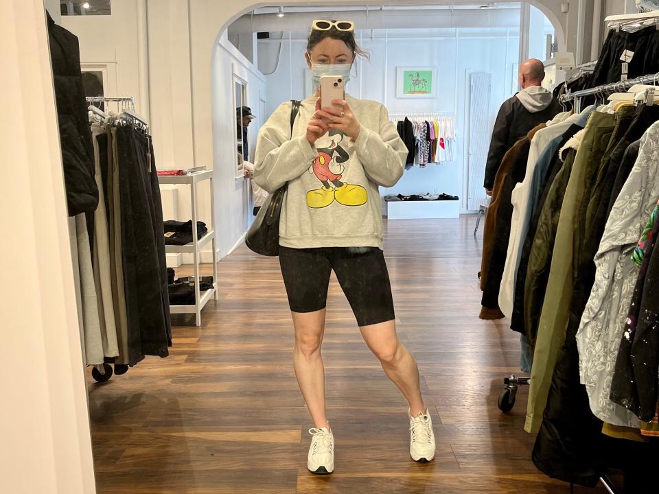 simone taking a mirror selfie in four horsemen menswear store in victoria canada