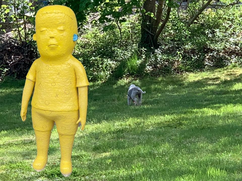 A 6-foot-tall yellow boy  made by Japanese artist Kensuke Yamada is part of the sculpture exhibit at Edgewood Farm, where Truro Center for the Arts will holds its "GalaBash" on Saturday to celebrate the center's 50th anniversary.