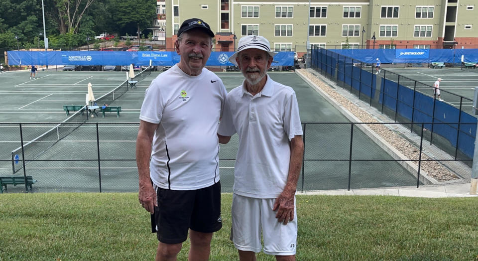 90-year-olds George McCabe (left) and Richard Stennett (right) faced off at the 90th Asheville Open Tennis Championship on Tuesday.