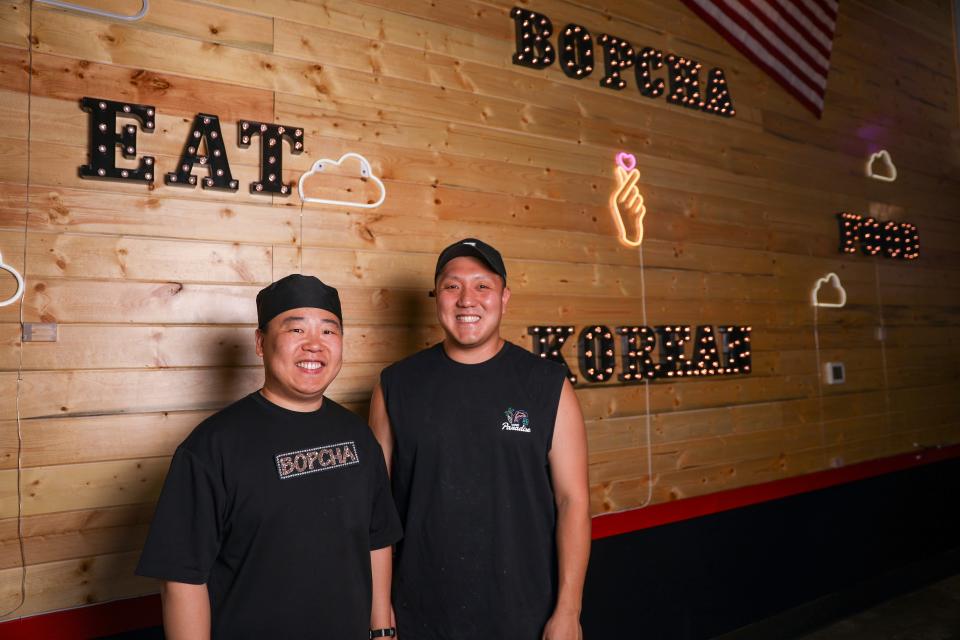 Bop Cha owners Jin Han and Jin Park stand in their newly opened restaurant inside Woodburn Premium Outlets on Friday, July 14, 2023 in Woodburn, Ore. 