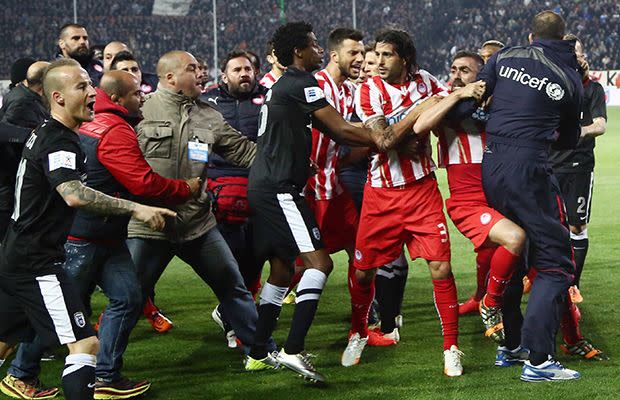 Players brawl during the fiesty match, which PAOK won 1-0. Source AAP