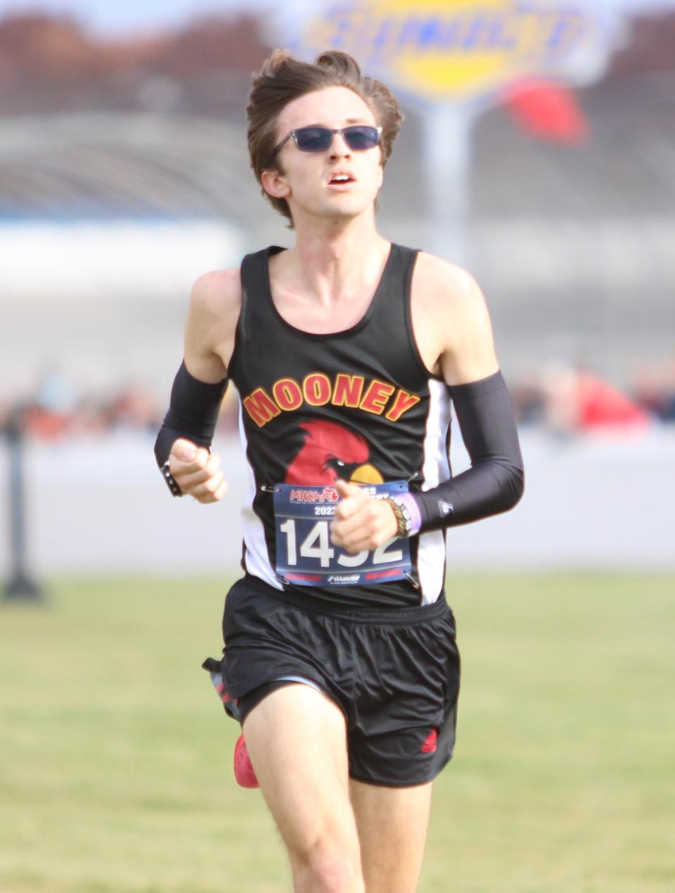 Cardinal Mooney's Tyler Lenn won the Division 4 boys state championship at the 2023 MHSAA cross country state finals at Michigan International Speedway on Saturday.