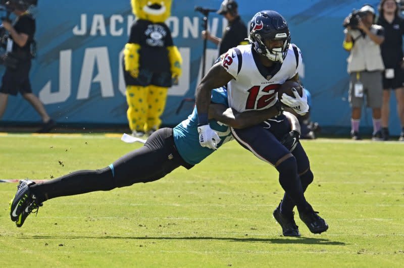 Houston Texans wide receiver Nico Collins (R) should receive more targets this week because of the season-ending ankle injury Tank Dell sustained in Week 14. File Photo by Joe Marino/UPI