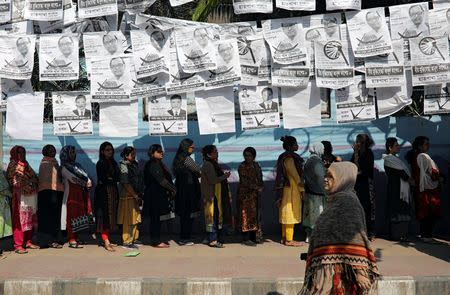 Voters queue at a voting center during the general election in Dhaka, Bangladesh December 30, 2018. REUTERS/Mohammad Ponir Hossain