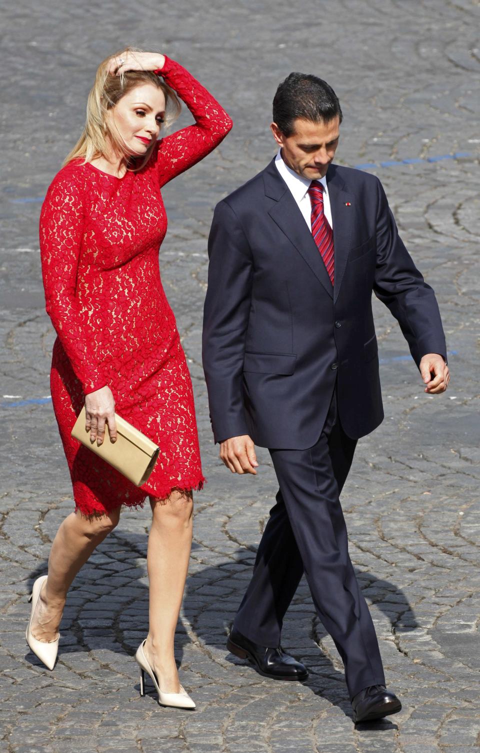 Mexico's President Enrique Pena Nieto and Mexico's First Lady Angelica Rivera arrive to attend the traditional Bastille Day military parade in Paris