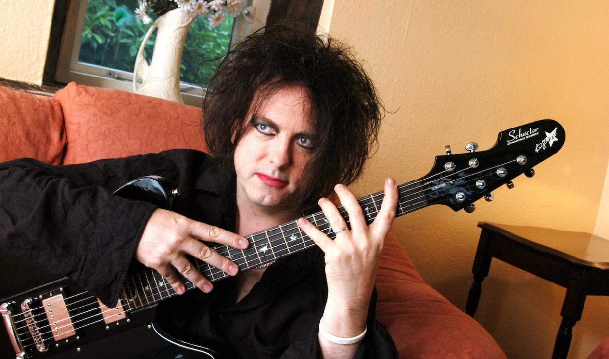  Robert Smith with Schecter guitar 