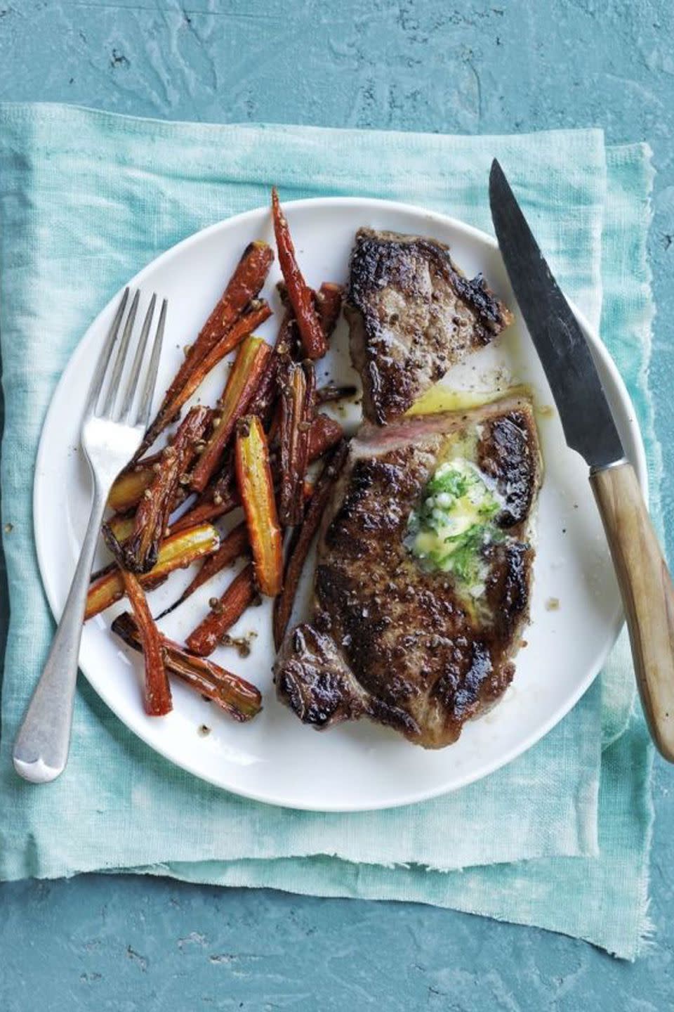 <p>Take steak dinner to a whole new level.</p><p><a rel="nofollow noopener" href="https://www.womansday.com/food-recipes/food-drinks/recipes/a53991/seared-steak-with-honey-roasted-carrots-recipe/" target="_blank" data-ylk="slk:Get the recipe.;elm:context_link;itc:0;sec:content-canvas" class="link "><strong>Get the recipe. </strong></a></p>