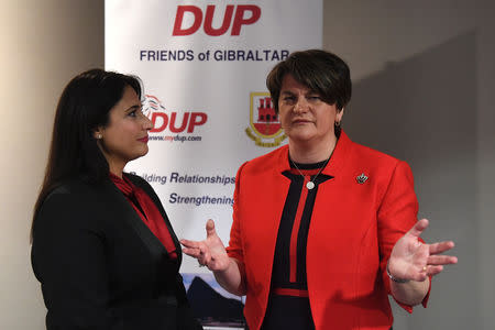 Democratic Unionist Party (DUP) leader Arlene Foster speaks with Gibraltar's Housing and Equality Minister, Samantha Sacramento, at the DUP annual party conference in Belfast, Northern Ireland November 24, 2018. REUTERS/Clodagh Kilcoyne