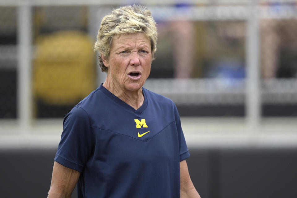 FILE - Michigan head coach Carol Hutchins calls out instructions during an NCAA softball game against South Dakota State, on May 20, 2022, in Orlando, Fla. Hutchins, the winningest coach in college softball history, said she was informed of the Supreme Court's decision to overturn the abortion rights provisions of Roe v. Wade via news alerts on her phone Friday. (AP Photo/Phelan M. Ebenhack, File)