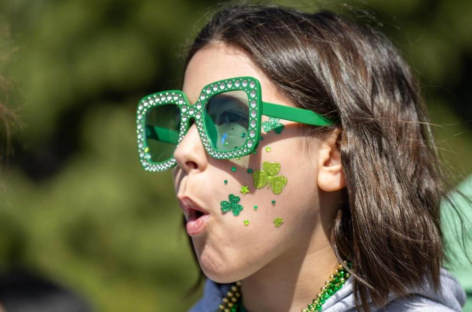 Bella Grippando, 11, of North Kansas City, donned her Irish apparel to watch the 38th annual Shawnee St. Patrick’s Day Parade on Sunday, March 10, 2024.