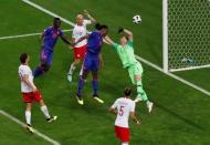 Soccer Football - World Cup - Group H - Poland vs Colombia - Kazan Arena, Kazan, Russia - June 24, 2018 Colombia's Yerry Mina scores their first goal REUTERS/Jorge Silva