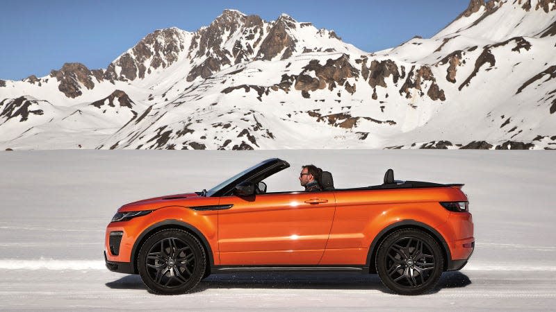 A photo of an orange Range Rover Evoque convertible. 