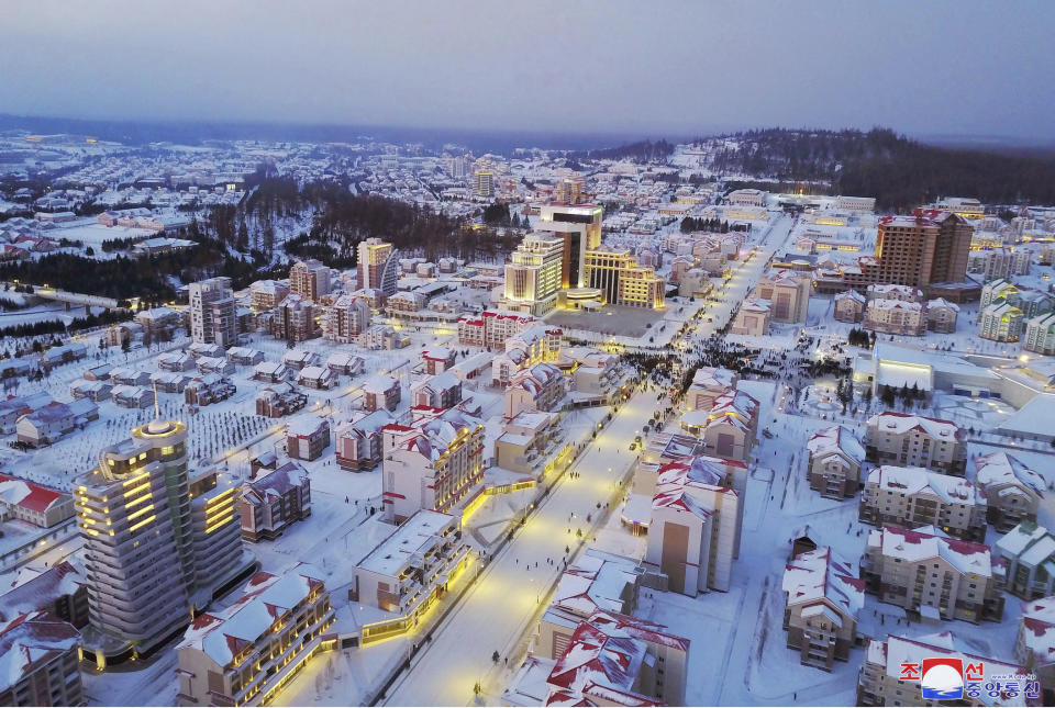 This Monday, Dec. 2, 2019, photo provided Tuesday, Dec. 3, 2019, by the North Korean government, the snow-covered Samjiyon city following its completion ceremony. On Monday, North Korean leader Kim Jong Un visited Samjiyon county at the foot of Mount Paektu to attend a ceremony marking the completion of work that has transformed the town to “an epitome of modern civilization,” KCNA said. It said the town has a museum on the Kim family, a ski slope, cultural centers, a school, a hospital and factories. Independent journalists were not given access to cover the event depicted in this image distributed by the North Korean government. The content of this image is as provided and cannot be independently verified. Korean language watermark on image as provided by source reads: "KCNA" which is the abbreviation for Korean Central News Agency. (Korean Central News Agency/Korea News Service via AP)