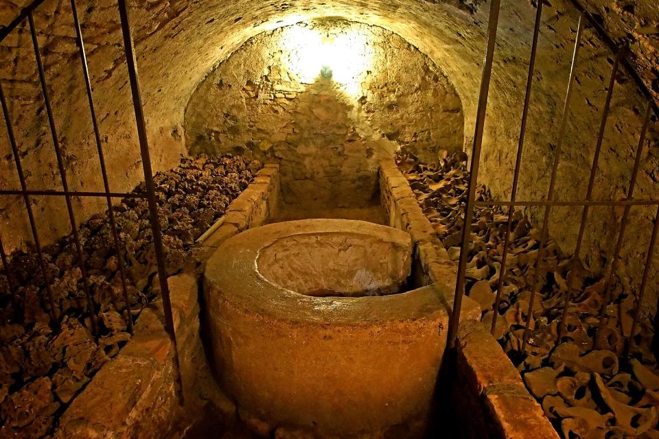 17th century underground tunnels and graves, plenty of bones, in the Catacombs of the monastery of San Francisco in Lima.