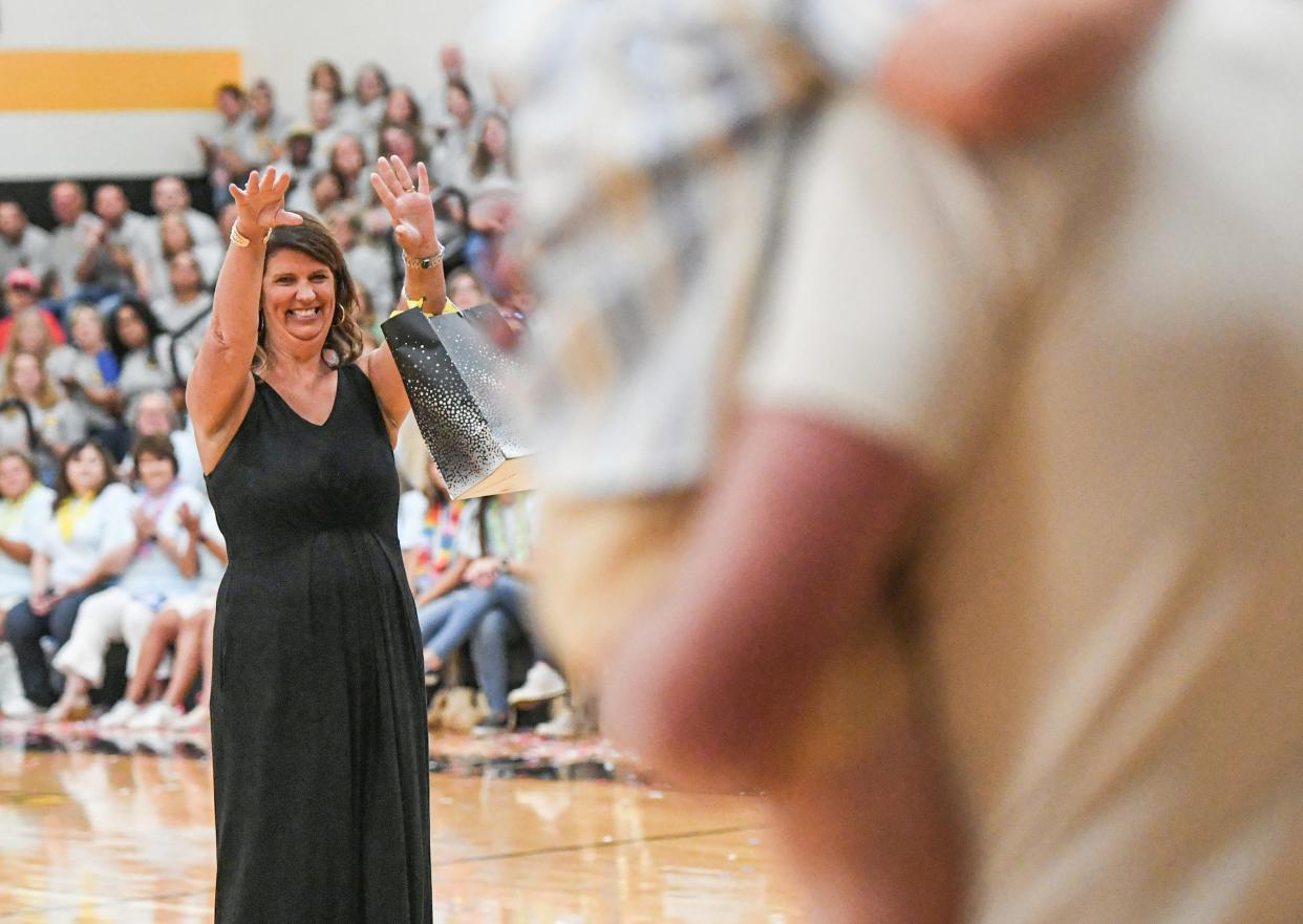 Terri Ivester, Reading Specialist at Starr Elementary smiles as she sees her family after being announced District Teacher of the Year during the Anderson School District 3 teacher and staff school kickoff in the Crescent High School gymnasium in Iva, S.C. Friday, July 26, 2024.