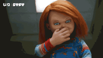 Chucky blowing a kiss and waving