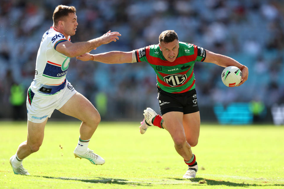 SYDNEY, AUSTRALIA - APRIL 06:  Jack Wighton of the Rabbitohs is tackled during the round five NRL match between South Sydney Rabbitohs and New Zealand Warriors at Accor Stadium, on April 06, 2024, in Sydney, Australia. (Photo by Mark Metcalfe/Getty Images)