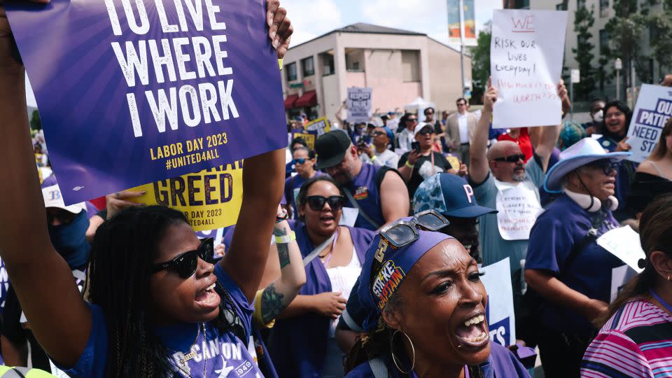 Thousands of healthcare workers march down W Sunset Blvd. to call for improved working conditions, better support systems and increased investment in the healthcare workforce at Kaiser Permanente Los Angeles Medical Center in Hollywood on Monday, Sept. 4, 2023 in Los Angeles, CA. - Dania Maxwell/Los Angeles Times/Getty Images