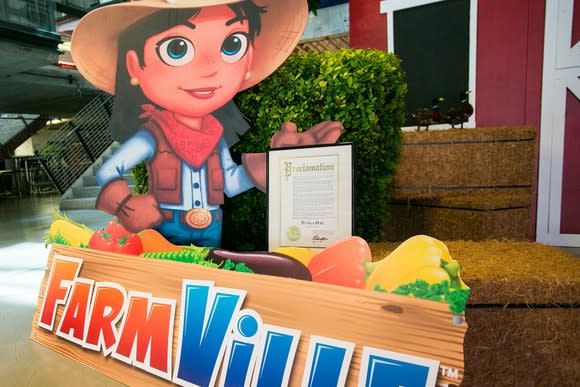 Cutout for FarmVille showing animated farmer, vegetables, and barn.