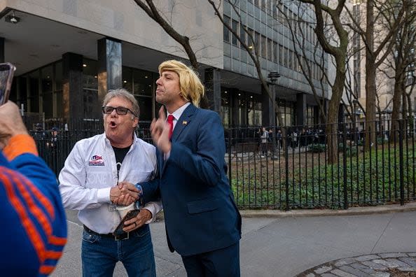 NEW YORK, NEW YORK - APRIL 15: Trump supporters, police and media gather outside of a the Manhattan Criminal Courthouse for the start of first-ever criminal trial against a former president of the United States on April 15, 2024 in New York City. Former President Donald Trump faces 34 felony counts of falsifying business records in the first of his criminal cases to go to trial. (Photo by Spencer Platt/Getty Images)