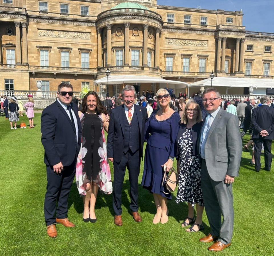 Somerset County Gazette: In the Buckingham Palace grounds. Pictured (left to right): Garryn and Gemma Basson, Clinton and Joanne Rogers, Jeanette and Ken Bird