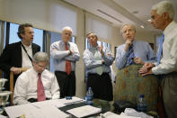 <p>Republican presidential hopeful Sen. John McCain, R-Ariz., is surrounded by staff and supporters at they monitor the Super Tuesday election returns at his home in Phoenix, Ariz., Feb. 5, 2008. From left are: advisor Mark McKinnon, campaign CEO Rick Davis, sitting, McCain, Sen. Lindsey Graham, R-S.C., Sen. Joseph Lieberman, I-Conn., and Florida Republican Gov. Charlie Crist. (Photo: Stephan Savoia/AP) </p>