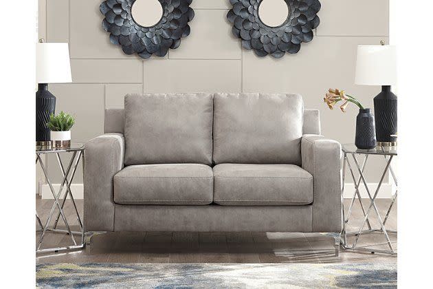 <p><strong>Ashley Furniture</strong></p><p>ashleyfurniture.com</p><p><strong>$656.99</strong></p><p><a href="https://go.redirectingat.com?id=74968X1596630&url=https%3A%2F%2Fwww.ashleyfurniture.com%2Fp%2Fryler-loveseat%2F4020135.html&sref=https%3A%2F%2Fwww.housebeautiful.com%2Fshopping%2Ffurniture%2Fg32407323%2Fapartment-sofas%2F" rel="nofollow noopener" target="_blank" data-ylk="slk:Shop Now" class="link ">Shop Now</a></p><p>If your apartment only has room for a loveseat, you may as well make it the cushiest, most comfortable loveseat you can find, right? This model is only 62 inches wide, but if those cushions don't make you want to curl up with a good book, we don't know what will. </p>