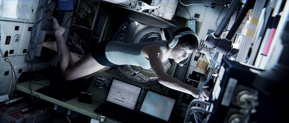 This publicity photo released by Warner Bros. Pictures shows Sandra Bullock, left, as Dr. Ryan Stone in “Gravity." (AP Photo/Courtesy Warner Bros. Pictures)