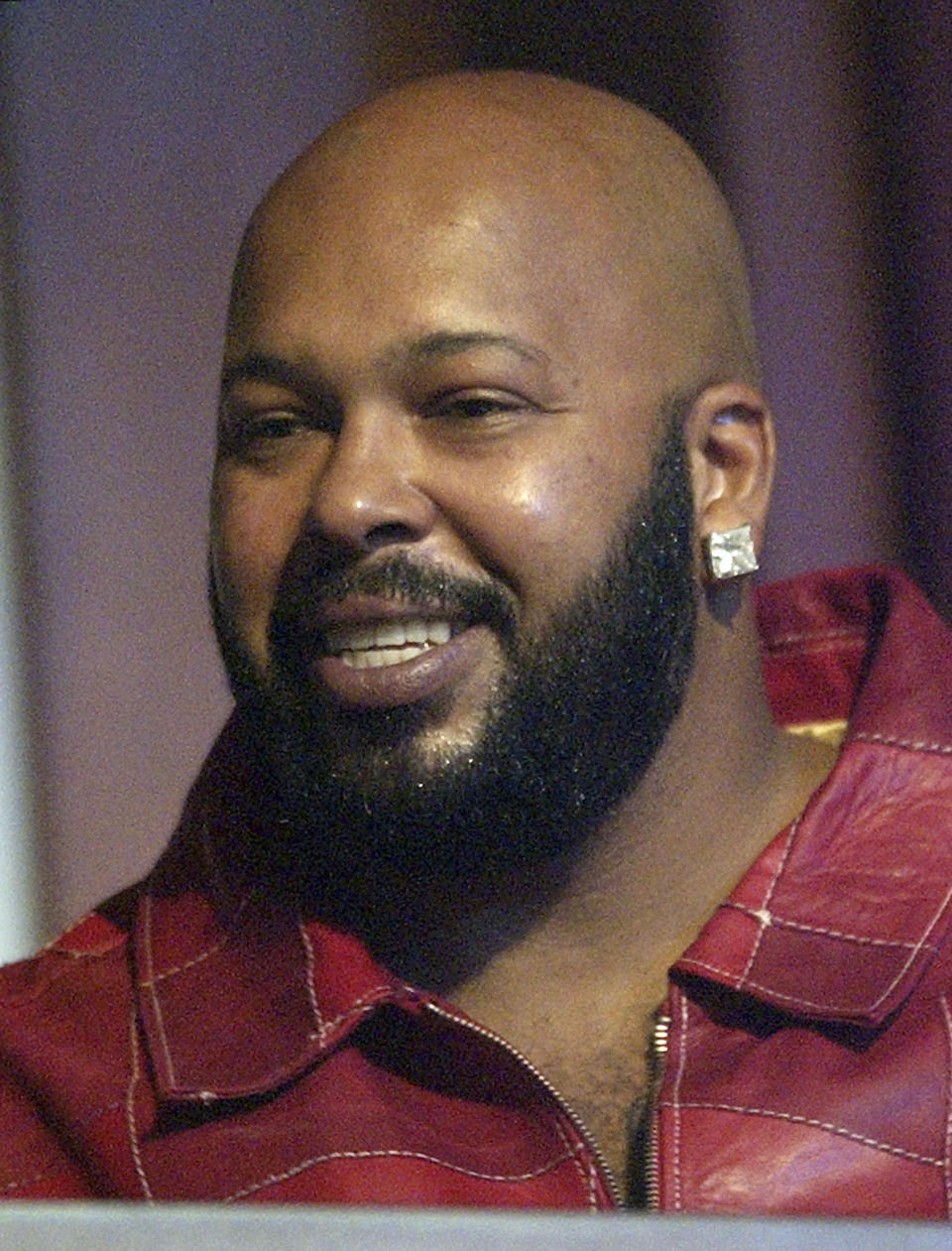 FILE - Rap producer Marion "Suge" Knight watches the 3rd annual BET Awards in the Hollywood section of Los Angeles, June 24, 2003. Knight was driving the BMW that was transporting rapper Tupac Shakur the night Shakur was shot in 1996. (AP Photo/Kevork Djansezian, File)