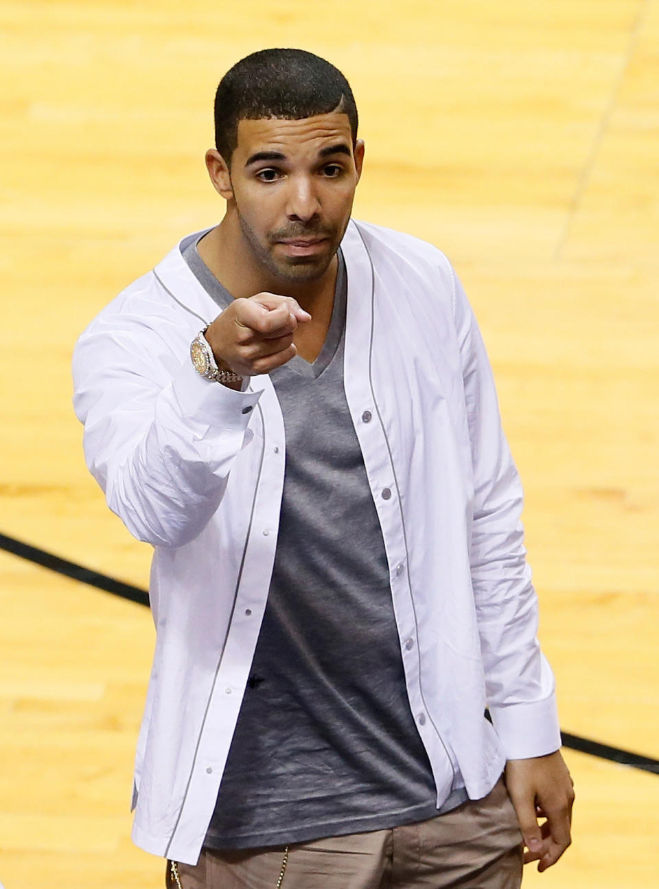 MIAMI, FL - JUNE 20:  Rapper Drake attends Game Seven of the 2013 NBA Finals at AmericanAirlines Arena between the San Antonio Spurs and the Miami Heat on June 20, 2013 in Miami, Florida. NOTE TO USER: User expressly acknowledges and agrees that, by downloading and or using this photograph, User is consenting to the terms and conditions of the Getty Images License Agreement.  (Photo by Kevin C. Cox/Getty Images)