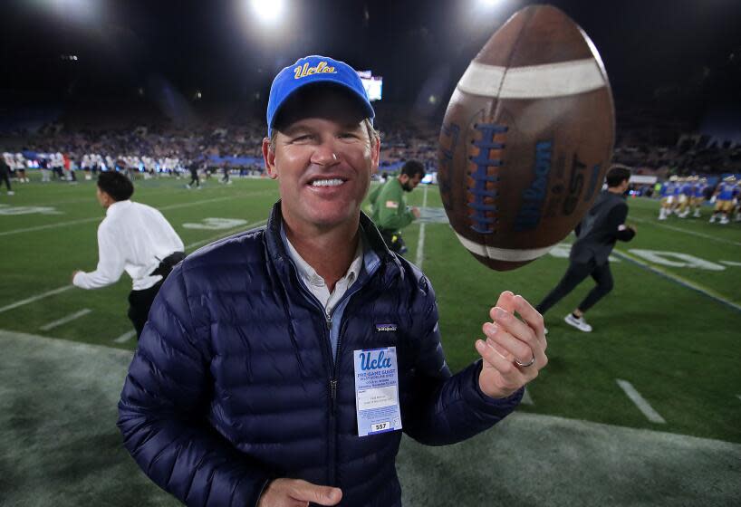 PASADENA, CALIF. NOV. 12, 2022. Former UCLA quarterback Cade McNown on the sideline before a PAC-12.