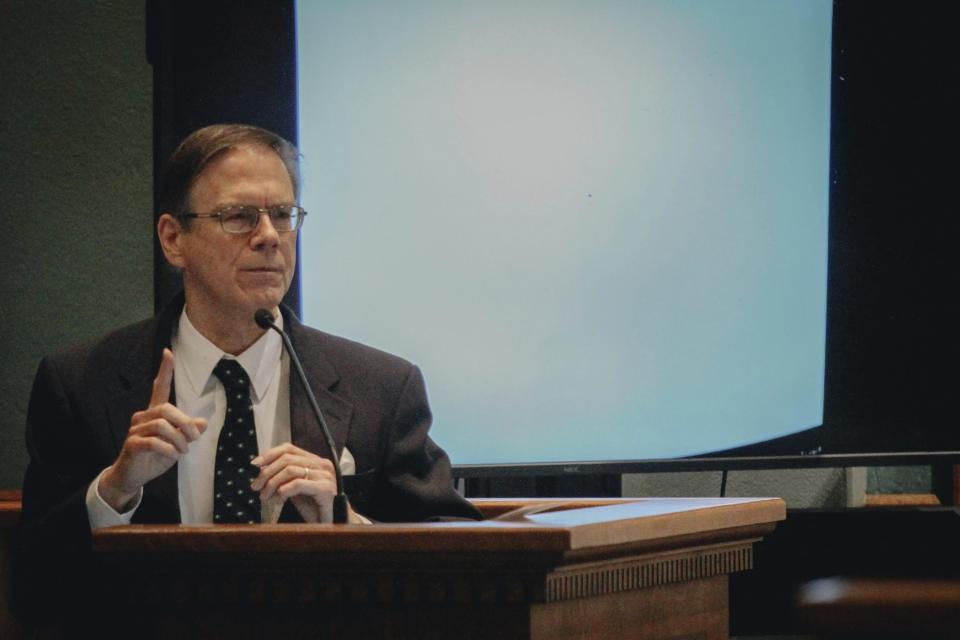 Keith Norton, a forensic pathologist for the Boone and Calloway County Medical Examiner's Office, testifies during Joseph Elledge murder trial, Wednesday, Nov. 10, 2021, in Columbia, Mo. Elledge is accused of killing his 28-year-old wife, whom he reported missing in October 2019. Her remains were found in March in a park near Columbia, Mo. (Madeline Carter/Columbia Daily Tribune via AP, Pool)