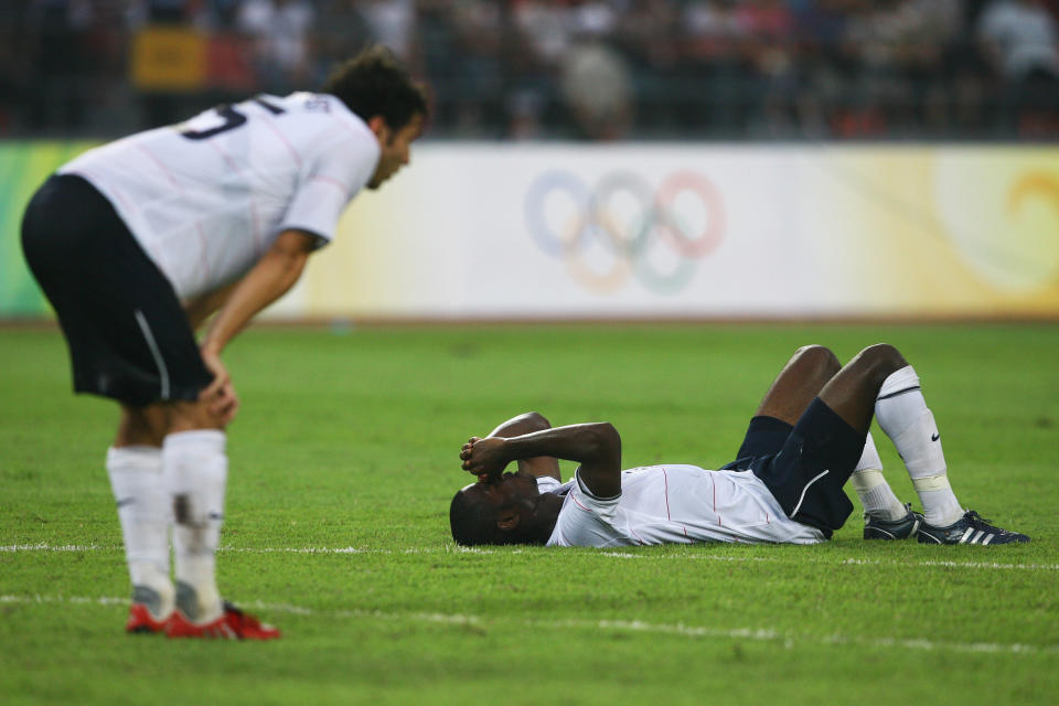 BEIJING - AUGUST 13:  (L-R) Michael Parkhurst and Maurice Edu #6 of the United States react after losing to Nigeria 2-1 during the Men's First Round Group B match on Day 5 of the Beijing 2008 Olympic Games on August 13, 2008 in Beijing, China.  (Photo by Shaun Botterill/Getty Images)