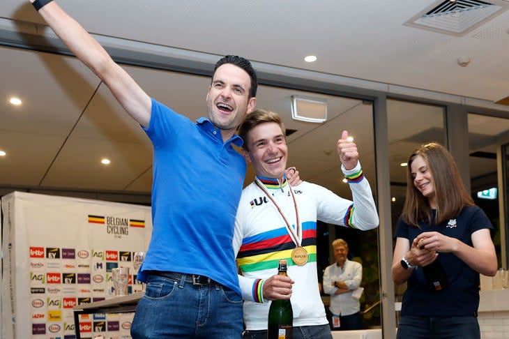 <span class="article__caption">Evenepoel celebrates with teammates.</span> (Photo: JAN DE MEULENEIR/POOL/AFP via Getty Images)