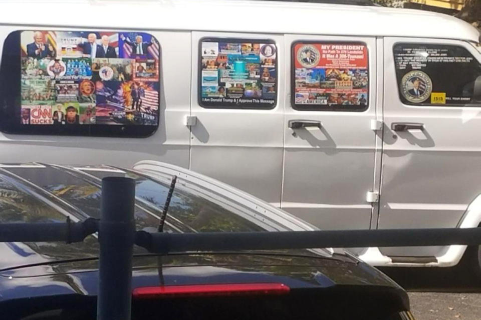 EDITORS AND LIBRARIANS: KILL FROM YOUR SYSTEMS AND ARCHIVES PHOTO NYDK510, SLUGGED “EXPLOSIVE DEVICES” AND TRANSMITTED ON FRIDAY, OCT. 26, 2018. THE COPYRIGHT OWNER IS NOT AUTHORIZING CONTINUED USE. This Nov. 1, 2017, photo shows a van with windows covered with an assortment of stickers in Florida. Federal authorities took Cesar Sayoc into custody on Friday, Oct. 26, 2018, and confiscated his van, which appears to be the same one, at an auto parts store in Plantation, Fla., in connection with the mail-bomb scare that has targeted prominent Democrats from coast to coast. (Courtesy of Lesley Abravanel via AP)