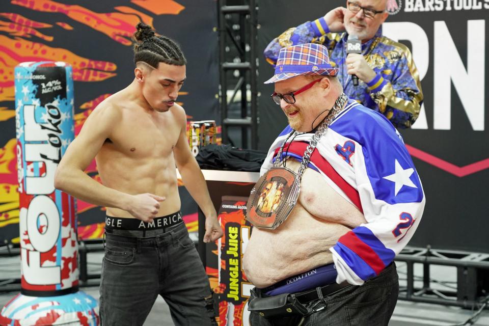 Woonsocket's Brian Rivera (left) is set to fight at Thursday's Rough N Rowdy and while his opponent didn't make Wednesday's weigh-in event, it allowed Rivera to have some fun with Barstool Sports personality Frank the Tank.