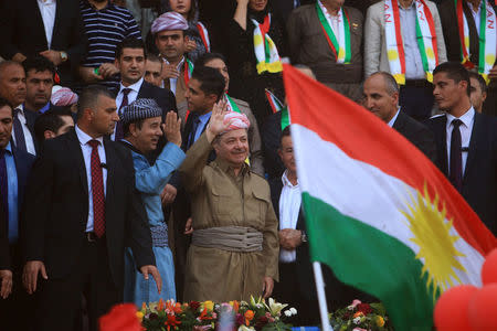 Iraqi Kurdish President Masoud Barzani salutes the crowd while attending a rally to show their support for the upcoming September 25th independence referendum in Duhuk, Iraq September 16, 2017. REUTERS/Ari Jalal