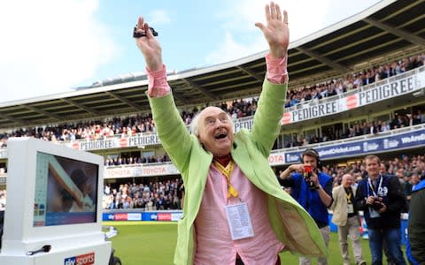 Blofeld waves to the crowd after ending his career