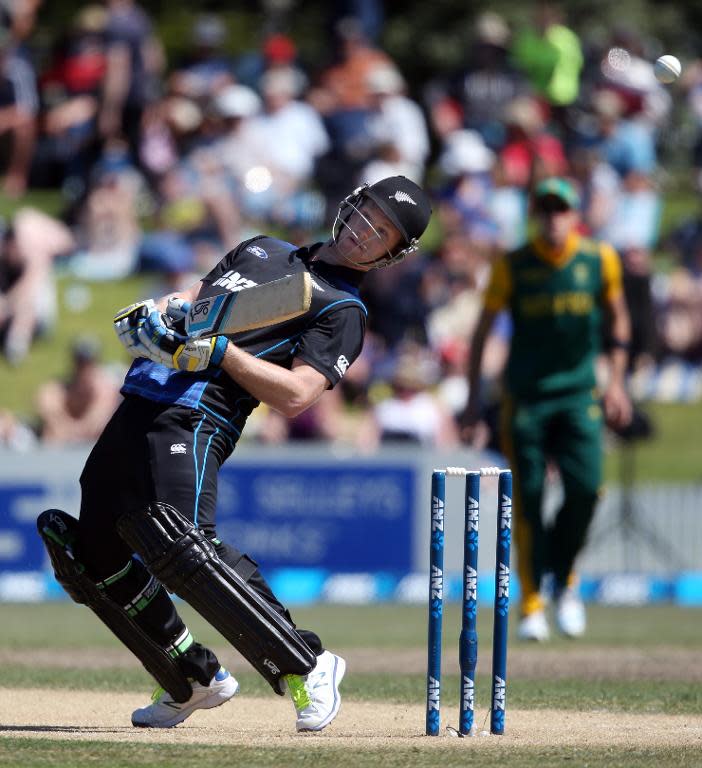 New Zealand's Jimmy Neesham ducks under a bouncer during the one day international cricket match against South Africa in Mount Maunganui on October 24, 2014