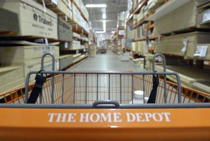 <p><b>3. Home Depot breach</b></p> <p><span>Of course, e-commerce has brought with it a whole new range of concerns as highlighted by the security breach of <a href="https://ca.finance.yahoo.com/q?s=HD&ql=0" data-ylk="slk:Home Depo;elm:context_link;itc:0;sec:content-canvas" class="link ">Home Depo</a>t’s point of sale system. Between April and September, hackers stole 53 million email addresses and customer data for 56 million debit and credit cards, which the company estimates will cost $2 to $3 billion in fraudulent purchases. As of late November the company was facing <a href="https://ca.finance.yahoo.com/news/home-depot-facing-at-least-44-civil-suits-in-data-breach-153819698.html" data-ylk="slk:44 lawsuits in Canada and the U.S.;elm:context_link;itc:0;sec:content-canvas;outcm:mb_qualified_link;_E:mb_qualified_link;ct:story;" class="link  yahoo-link">44 lawsuits in Canada and the U.S. </a>as a result of the data breach.</span> (REUTERS/Jim Young)</p>