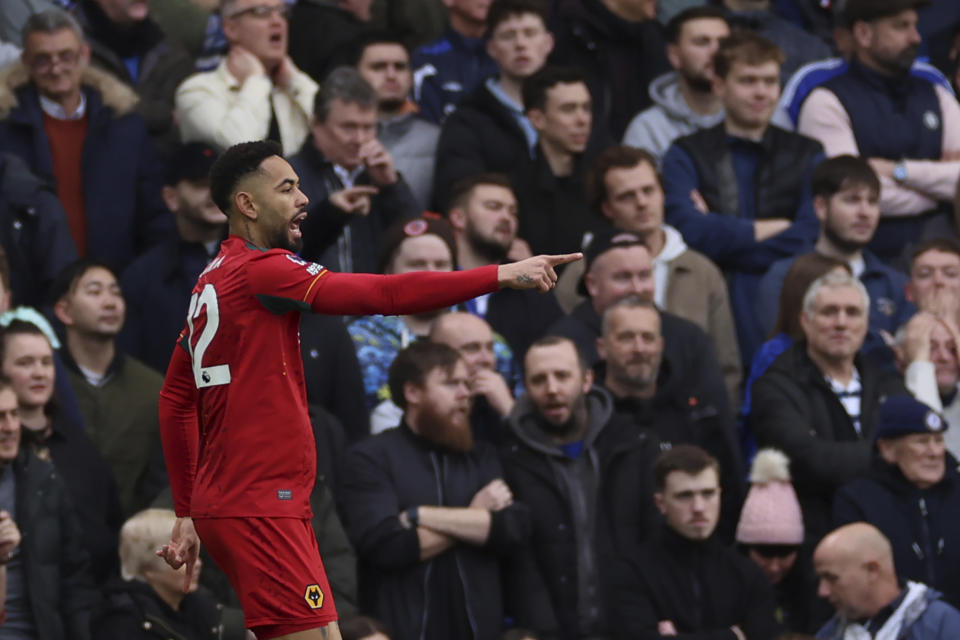 Wolverhampton Wanderers' Matheus Cunha celebrates after scoring his sides first goal during the English Premier League soccer match between Chelsea and Wolverhampton Wanderers at Stamford Bridge stadium in London, Sunday, Feb. 4, 2024. (AP Photo/Ian Walton)