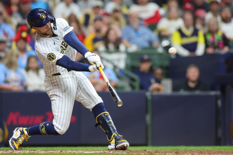 Brewers first baseman Rhys Hoskins hits a three-run home run  in the seventh inning Saturday night.