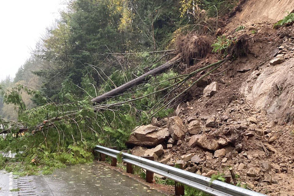 In this photo provided by the Washington State Department of Transportation, a rock and mudslide briefly closed a portion of Interstate 5 through Bellingham, Wash., on Monday, Nov. 15, 2021. There was widespread flooding in the area as storms continued in the Pacific Northwest. (Washington State Department of Transportation via AP)