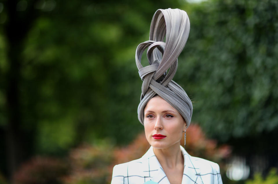 Valerie Stark chose an elegant headpiece for the fourth day to accessorise her checked co-ord. <em>[Photo: Getty]</em>