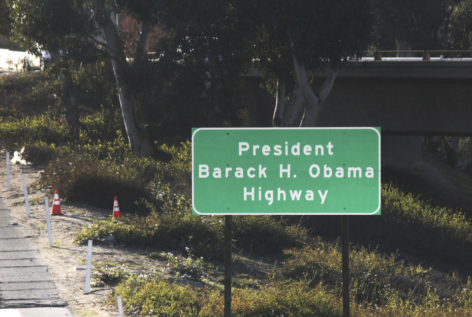 Signs have gone up naming a section of a Los Angeles-area freeway as the President Barack H. Obama Highway, seen from Pasadena, Calif., Thursday, Dec. 20, 2018. The signs posted Thursday on State Route 134 apply to a stretch running from State Route 2 in Glendale, Calif., through the Eagle Rock section of Los Angeles to Interstate 210 in Pasadena. The former president attended Occidental College in Eagle Rock from 1979 to 1981 and lived in Pasadena. (AP Photo/John Antczak)