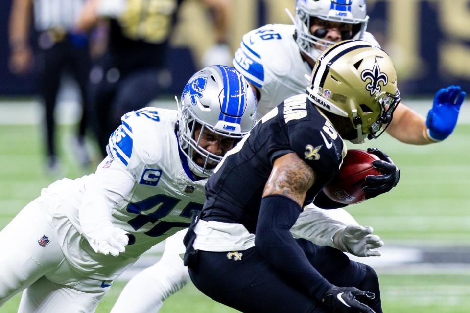 New Orleans Saints wide receiver Lynn Bowden Jr. (5) is tackled by Detroit Lions linebacker Jalen Reeves-Maybin (42) during the first half at the Caesars Superdome.