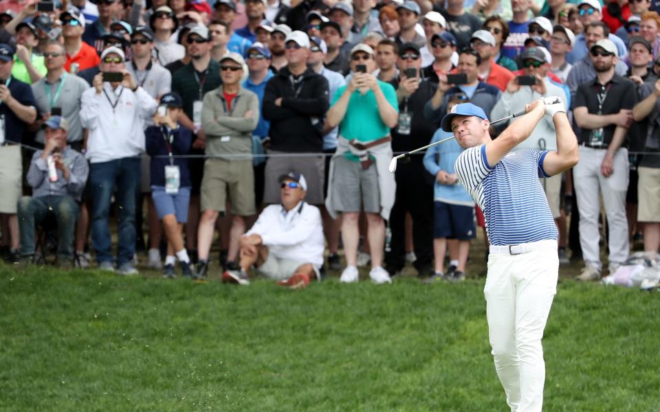 Paul Casey of England plays a shot from the 17th tee during the final round of the 2019 PGA Championship at the Bethpage Black course on May 19, 2019 in Farmingdale