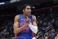 Detroit Pistons guard Jaden Ivey reacts after a play during the first half of an NBA basketball game against the Boston Celtics, Monday, Feb. 6, 2023, in Detroit. (AP Photo/Carlos Osorio)