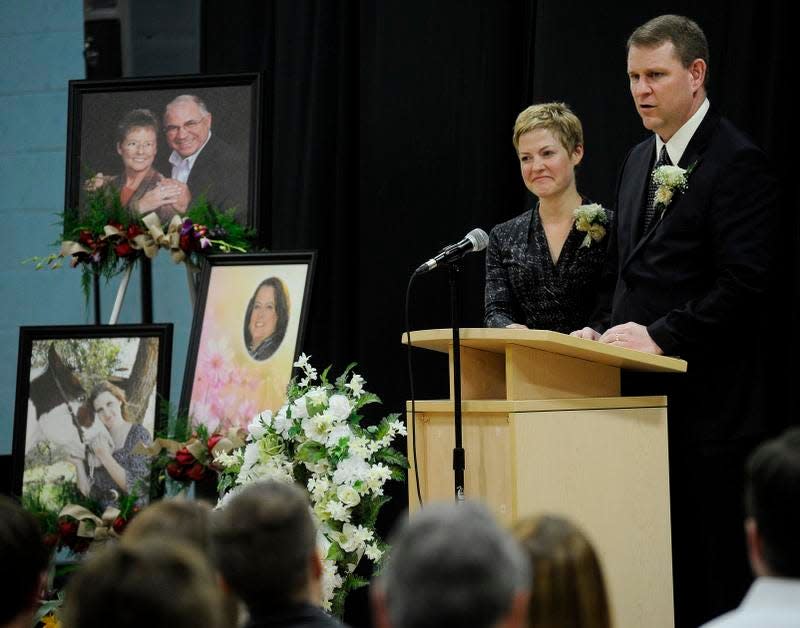 Jennifer Ladwig, the daughter of Glenn and Elaine Mull, who died in last month’s plane crash in Bellevue, and Doug Harter, whose wife, Amy, and daughter Samantha Harter also died in the crash, thank the community for its support during a memorial service Saturday at the Bellevue YMCA.